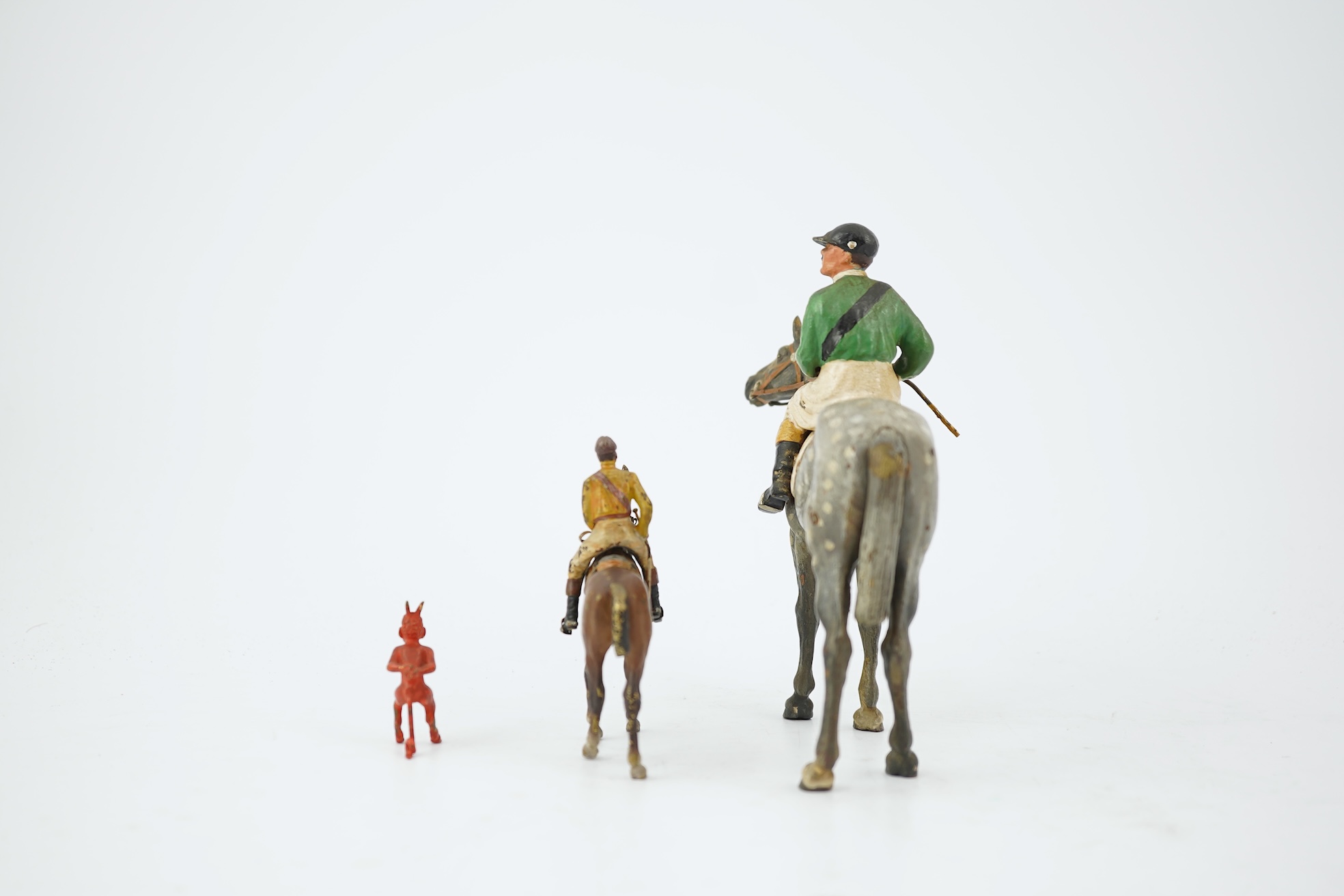 Two Austrian cold-painted bronze figures groups of jockeys on racehorses, early 20th century